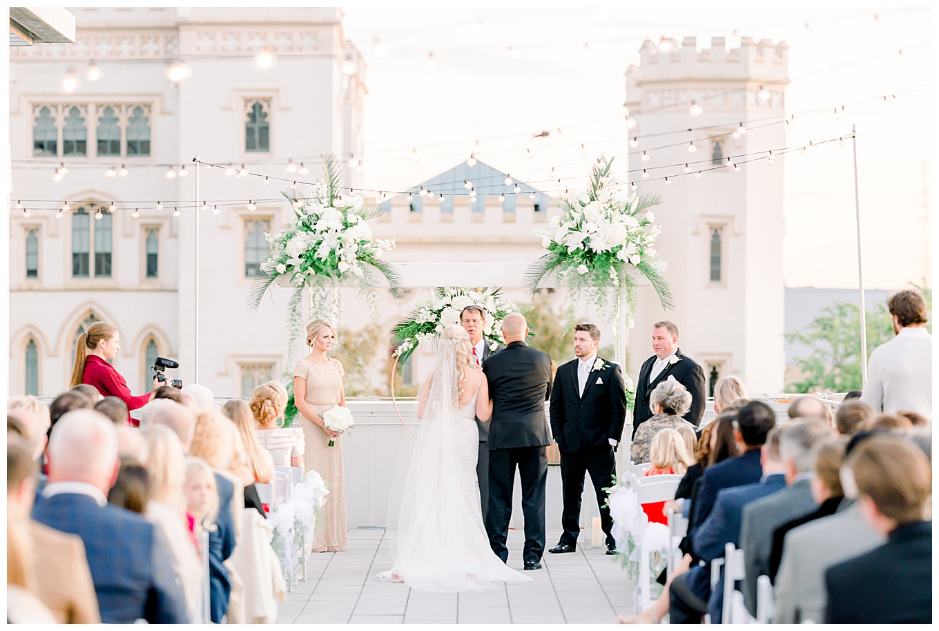bride and groom at altar on rooftop in baton rouge